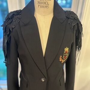 Elegant. Dark. Unforgettable.NICOLE MILLER Black Statement Blazer.